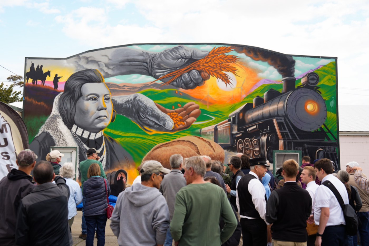 Crowd gathered at the unveiling of the Columbia County Sesquicentennial mural in Dayton, Washington